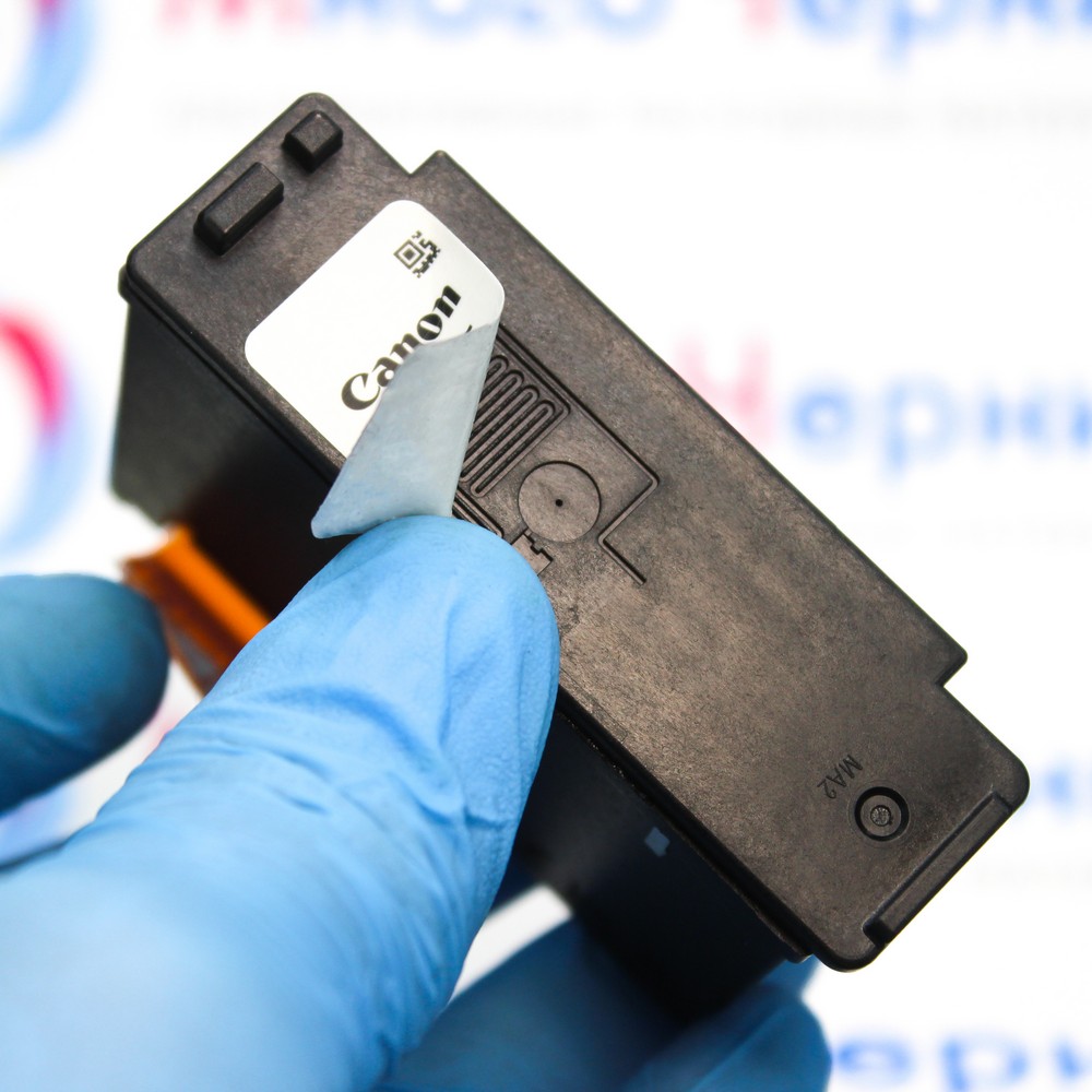 Заводская наклейка и вентиляционная система черного картриджа Canon PG-495
